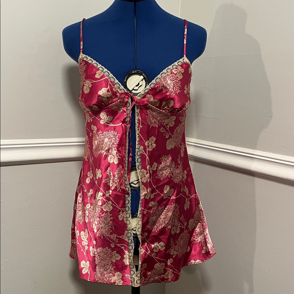 Victoria’s Secret pink, satin, lingerie top with lace edges. Size Small.